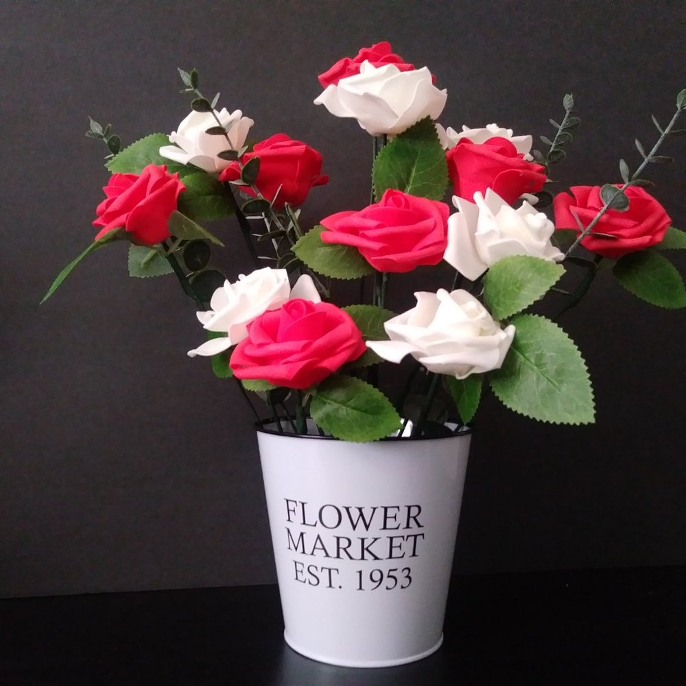 Bouquet of foam roses in red and white tones,
